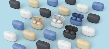 A selection of LinkBuds S in their charging cases in a range of colours: White, Grey, Gold, and Earth Blue